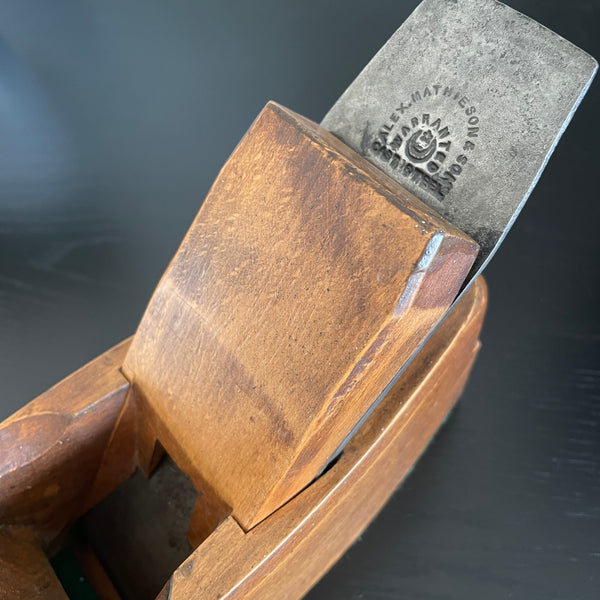 Close up of original branding from the 19th Century of cutting steel on upcycled lamp crafted by Shades at Grays