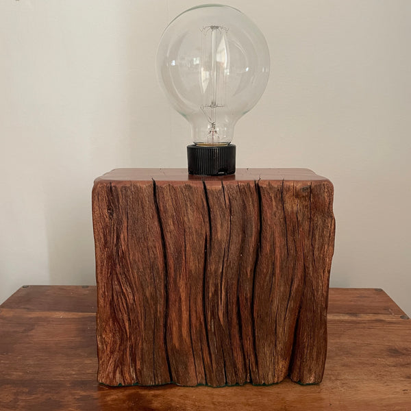 Wood table lamp made from upcycled wharf timber and replica edison bulb, unlit,  front view, handcrafted by shades at grays.