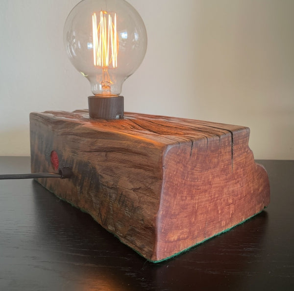 Wood table lamp upcycled from original 100 year old wharf timber, with addition of replica edison bulb, smooth back view and side, handcrafted by shades at grays