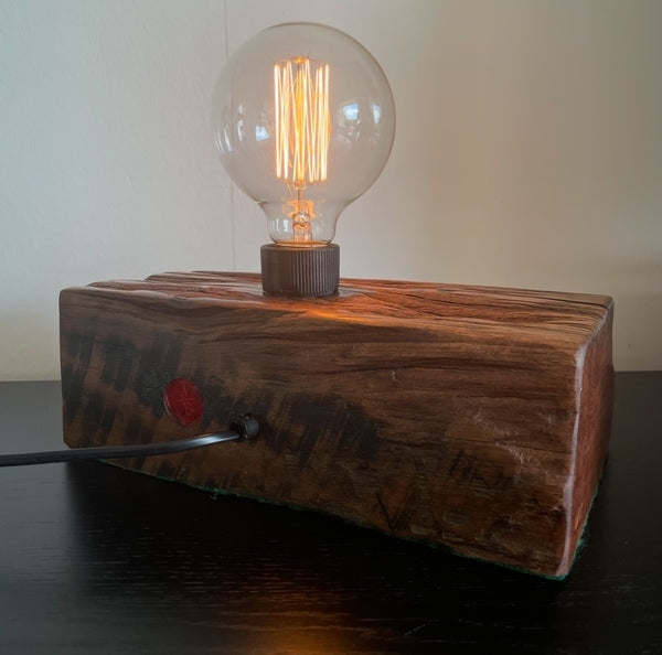 Wood table lamp upcycled from original 100 year old wharf timber, with addition of replica edison bulb, smooth back view with makers branding, handcrafted by shades at grays