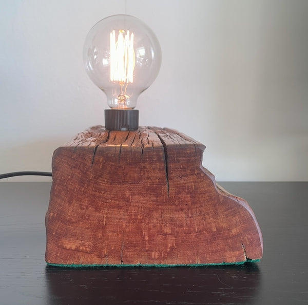 Wood table lamp upcycled from original 100 year old wharf timber, with addition of replica edison bulb, smooth  side view, handcrafted by shades at grays