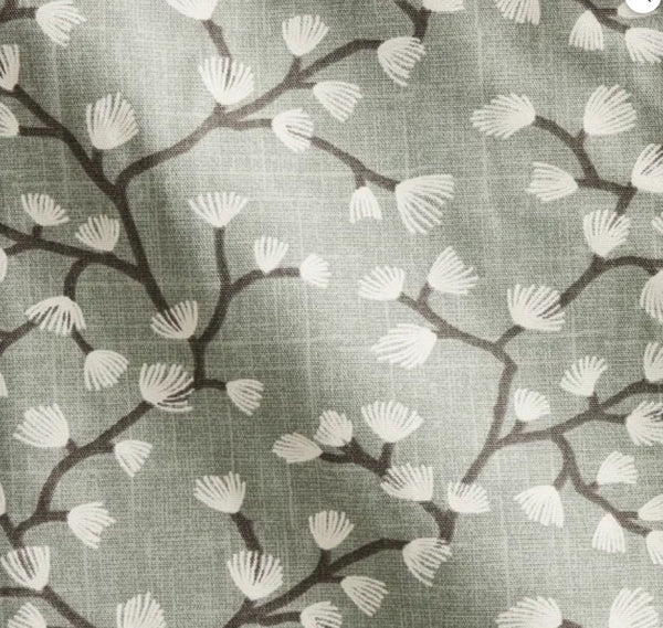Close up of Spring Buds Seafoam fabric: cream fan-shaped buds on soft grey branching stems against a gentle seafoam green background.
