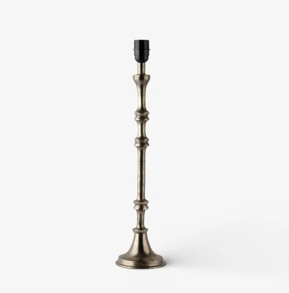 Antique silver candlestick table lamp base with sculpted stem and round foot, without a shade