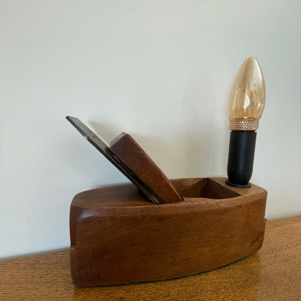 Authentic carpenter's plane upcycled into heritage lamp by Shades at Grays, front view with E14 candle bulb, unlit.