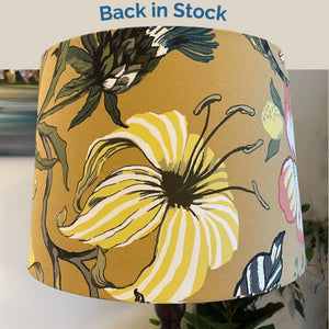 Mustard floral fabric for handcrafted lampshades by shades at grays back in stock.