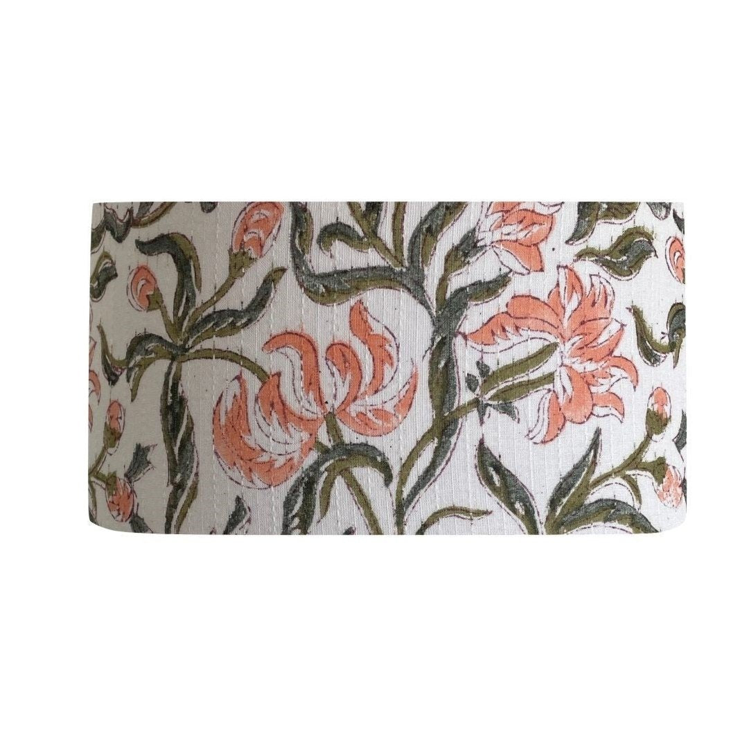 Barrel style lampshade with blush bloom fabric, handcrafted by shades at grays.