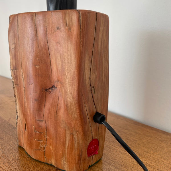 Bees wax polished side and back of wood table lamp by shades at grays