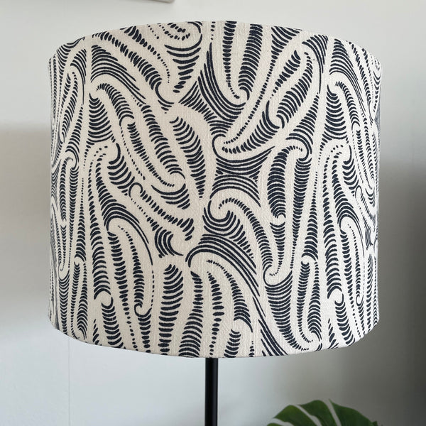 Bespoke medium sized drum lampshade by shades at grays, nz with Aho Creative fabric, unlit.