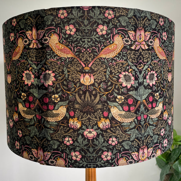 Bespoke fabric lampshade with William Morris Strawberry Thief Black fabric and 2 seams in large barrel lamp shade.