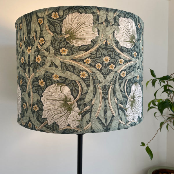 Bespoke medium size drum lamp shade with William Morris Pimpernel Olive fabric, lit, by shades at grays nz.