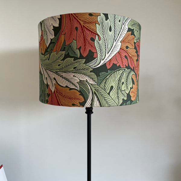 Bespoke medium drum  light shade, with Morris and Co Acanthus Autumn fabric, on black lamp base, by shades at grays nz