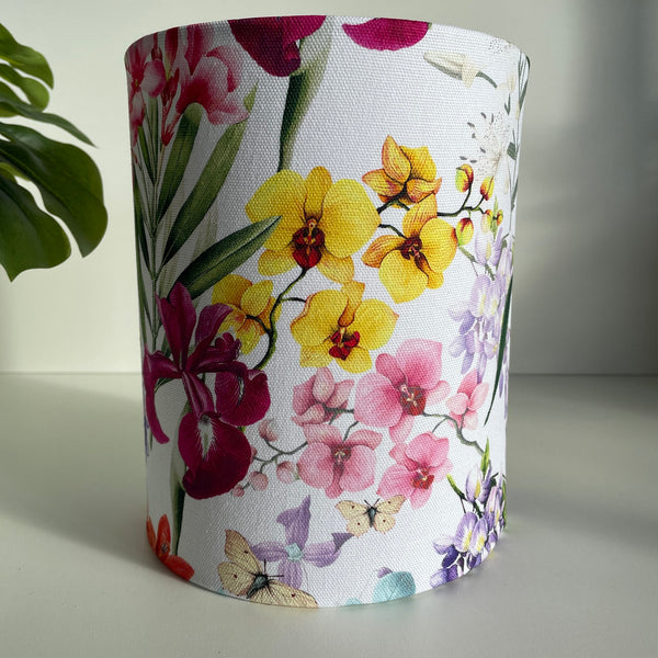 Bespoke medium lamp shade made in nz by shades at grays, close up of multi colour orchids and butterflies.