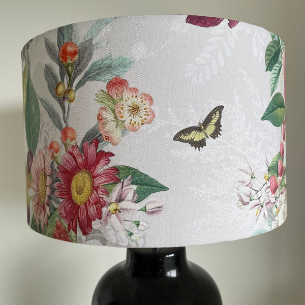 Butterfly and spring hedgerow flowers on a grey and white background, fabric lampshade made by shades at grays