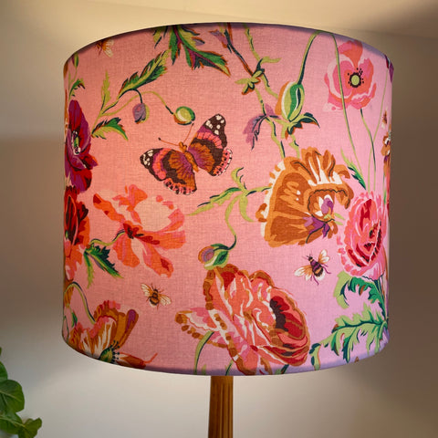 Large drum light shade with Kaffe Fassett meadow pastel fabric, lit, by shades at grays, nz.