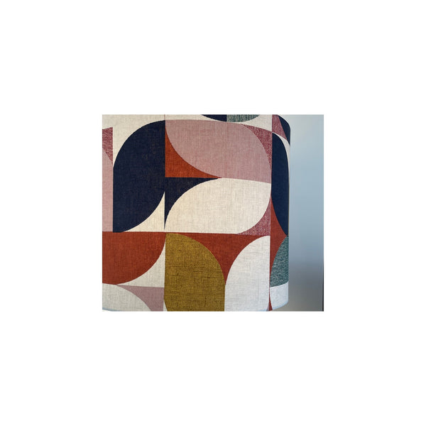 Close up of bold and beautiful fabirc on handcrafted lampshade.