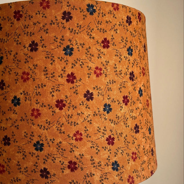 close up of lampshade in cornflower on brown
