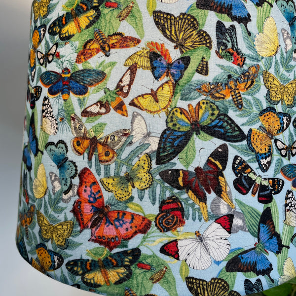 Close up of butterfly heaven fabric on bespoke lamp shade, made by Shades at Grays in new zealand.