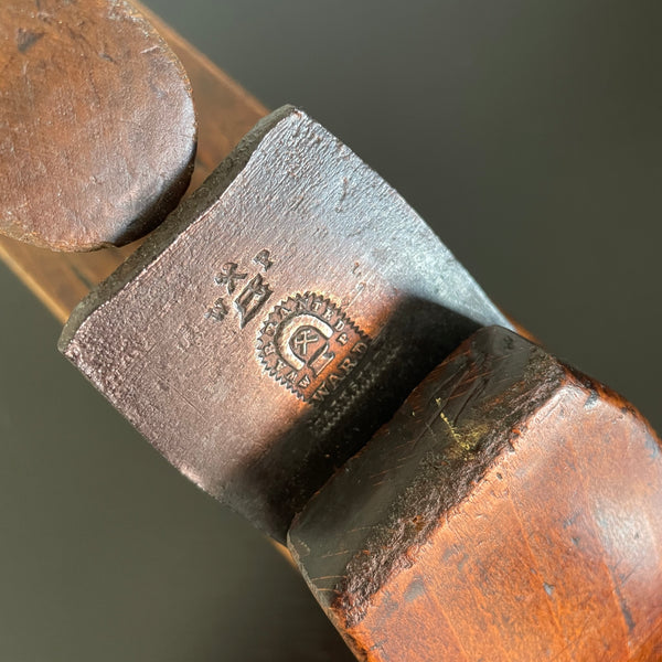 Close up of original branding on cutting steel dating from over a 100 years ago.