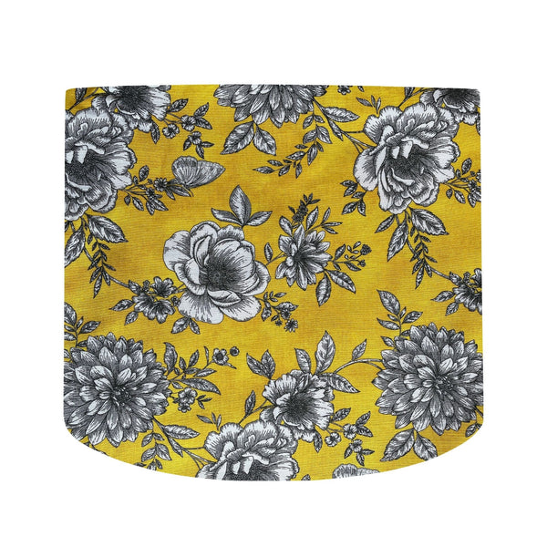 Drum lampshade handcrafted by shades at grays with floral glow fabric.