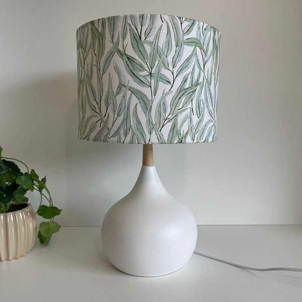 Drum lampshade with eucalyptus fabric on white base, unlit, handcrafted by shades at grays, nz