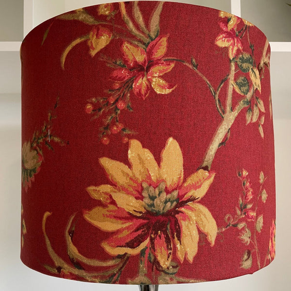 Drum style lampshade with golden harvest on red fabric, unlit, handcrafted by shades at grays, nz