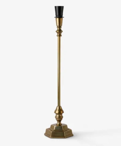 Antique gold table lamp base with a slender stem and stepped hexagonal foot, without a lampshade