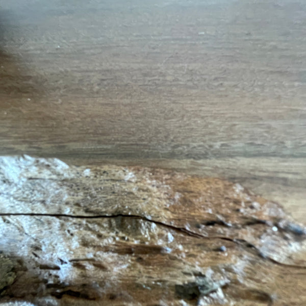 Handcrafted heritage lamp by shades at grays using a reclaimed jarrah beam, close up of wood grain.