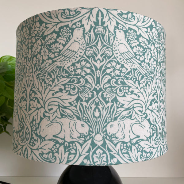 Hnadcrafted lampshade, medium drum with William Morris Brer Rabbitt fabric, unlit, by shades at grays nz.