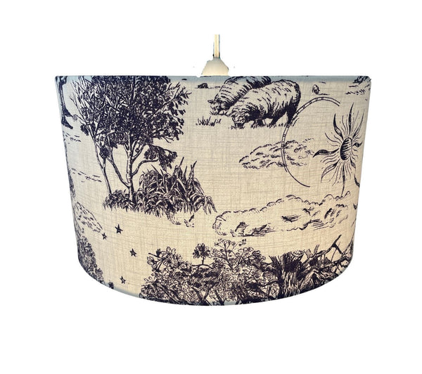 Lampshade with nature-themed design featuring animals and landscapes on a white background