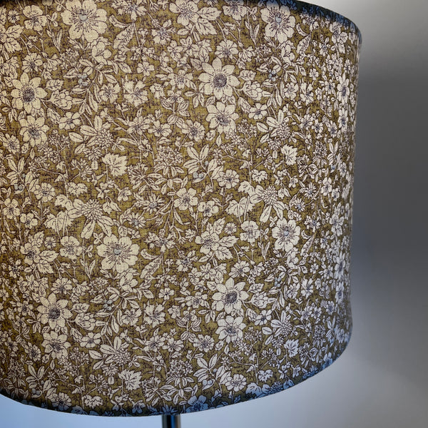 Bespoke lamp shade with manuka sage frabric, close up.