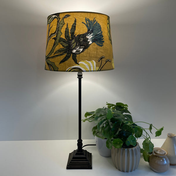 ShaMustard floral lampshade, tapered 24, lit, handcrafted lighting made in new zealand. Thistle as focus.