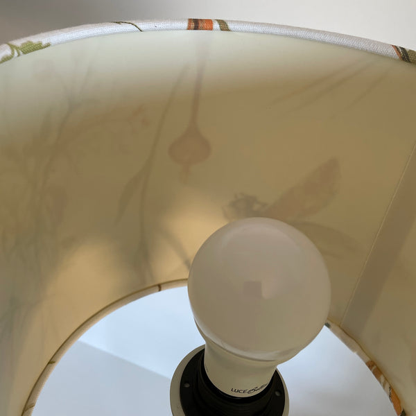 Interior of cream dragonfly lampshade, some yellowing of plastic.