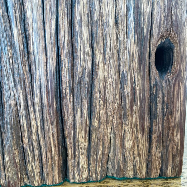 Jarrah wood table lamp handcrafted by shades at grays, close up of eroded grooves.