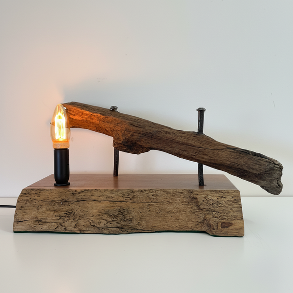 Heritage table lamp crafted by shades at grays from wharf timber, front view.
