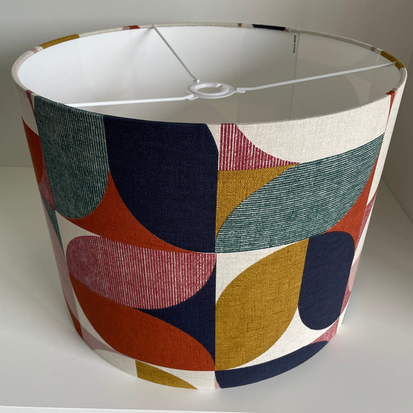 Large drum ceiling lampshade in bold and beautiful fabric based on geometric pattern, handcrafted by shades at grays.