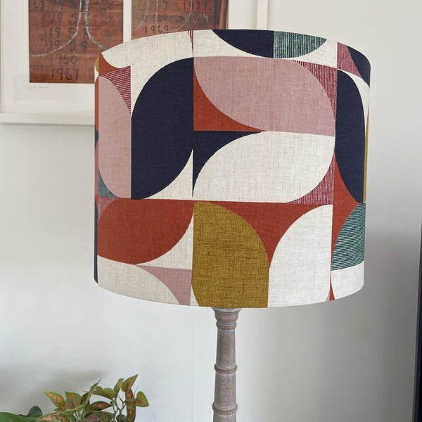 Large drum lampshade in bold and beautiful fabric based on geometric pattern, unlit, handcrafted by shades at grays.