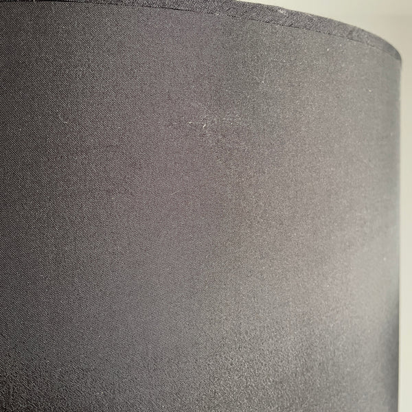 Large black drum lampshade with slight mark on exterior.