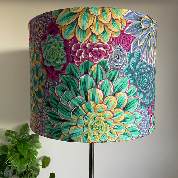 Large drum bespoke lamp shade made in nz by shades at grays using Kaffe Fassett House Leeks fabric grey, unlit, green leaves.