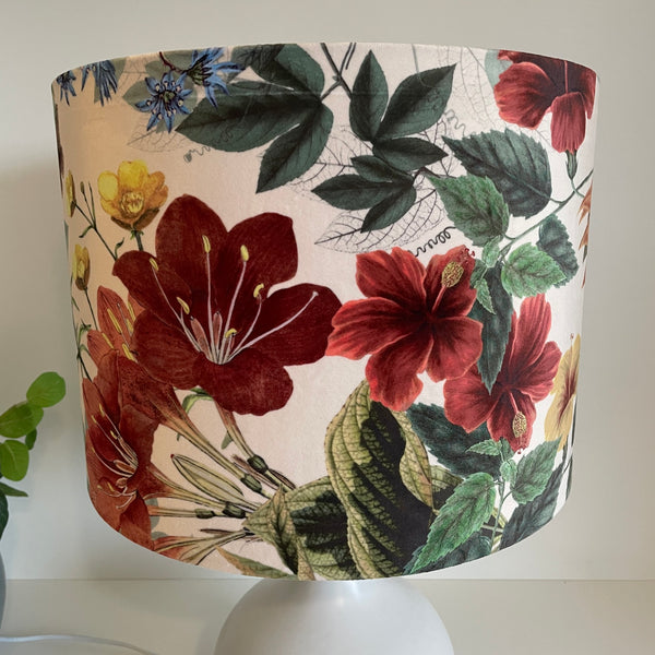 Large drum lampshade with velvet bouquet fabric, ruby red blossoms, unlit.