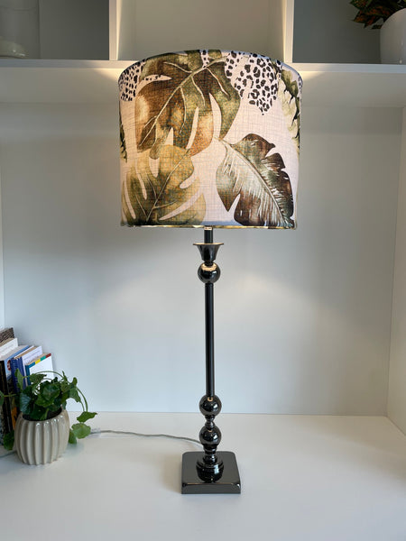Large drum style light shade with jungle chic fabric on metal lamp base by shades at grays, nz