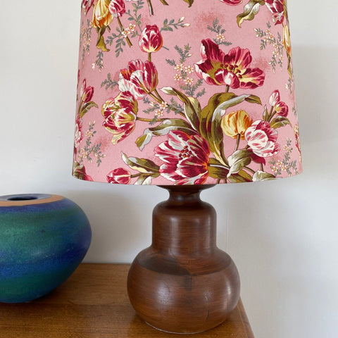 Large tapered handcrafted lampshade with tulip bouquet fabric, unlit, sold by shades at grays.