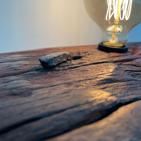 Large wood table lamp crafted by shades at grays from wharf timber with original nail and replica edison bulb.
