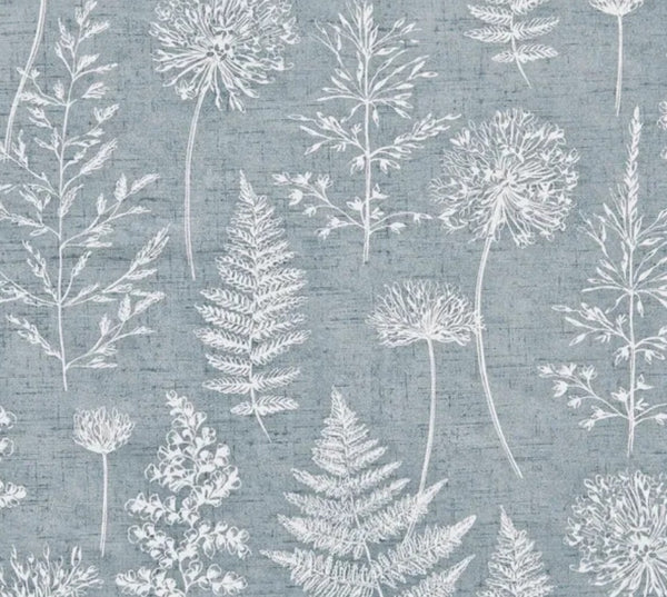 Close up of Meadow Grey Denim fabric: white silhouettes of ferns, seed heads and grasses on a soft blue-grey denim background.