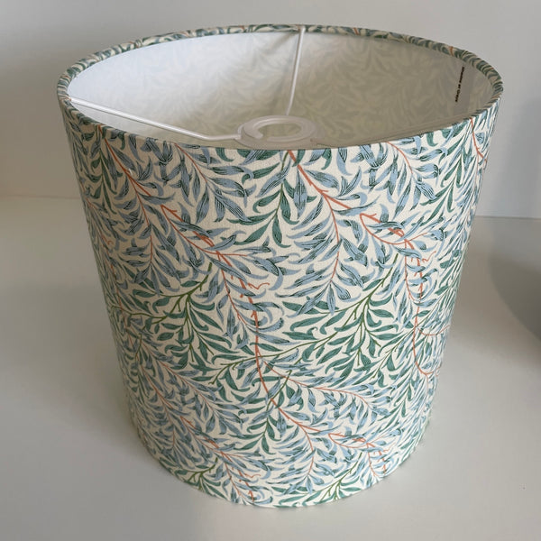 Medium cylinder lampshade in william morris willow boughs cream fabric, unlit, ceiling fitting.