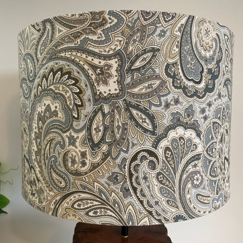 Medium drum handcrafted light shade nz by shades at grays with slate blue paisley fabric, unlit.