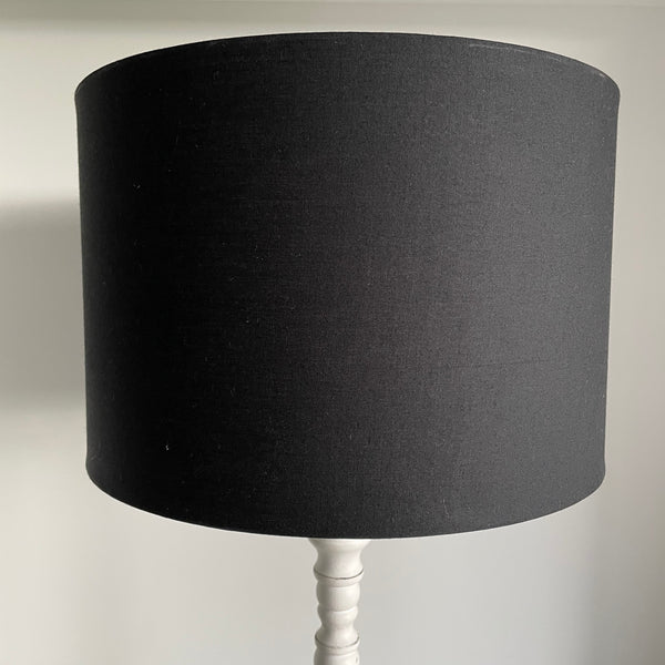 Medium black drum lampshade 35 cm wide and 25 cm high, unlit.