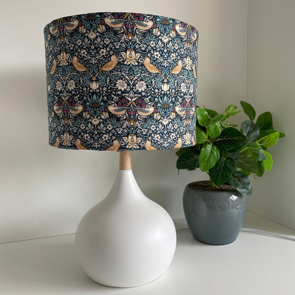 Medium drum lightshade with strawberry thief mini teal fabric on white base, unlit by shades at grays nz.