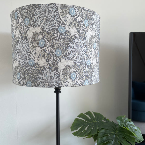 Medium drum style lampshade with Morris Pure Seaweed fabric on black base, unlit by shades at grays, nz.