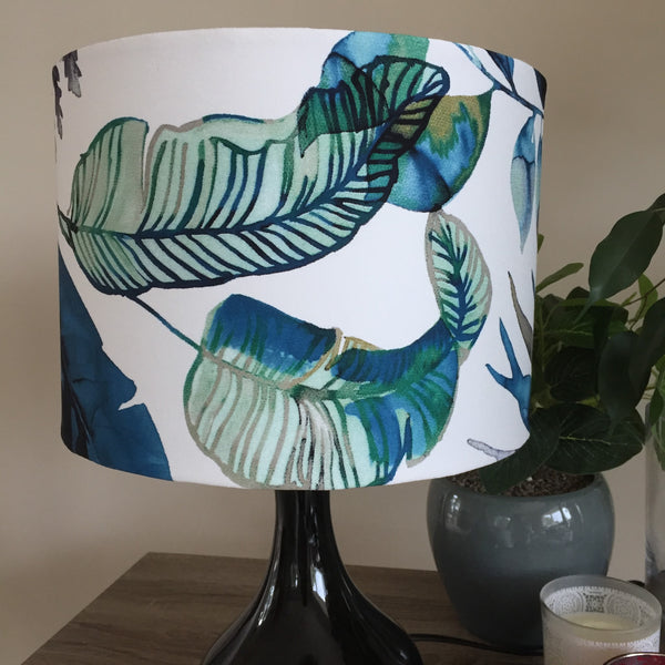Medium drum handcrafted fabric lamp shade with watermark palm fabric, unlit.