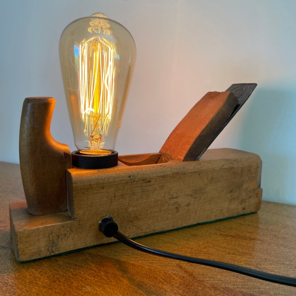 Mid-century S.B. Tool Company wood plane converted into a bespoke desk lamp showing the original British craftsmanship, back view.